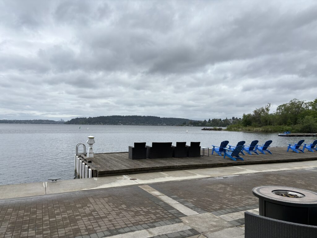 chairs on a dock by water