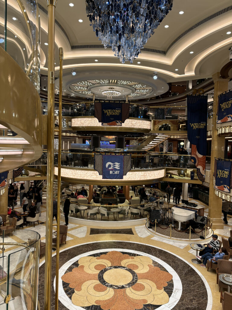 a large building with many floors and a chandelier