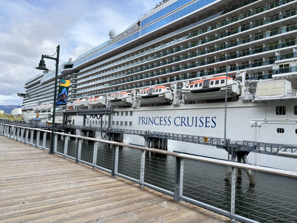 a cruise ship docked at a dock