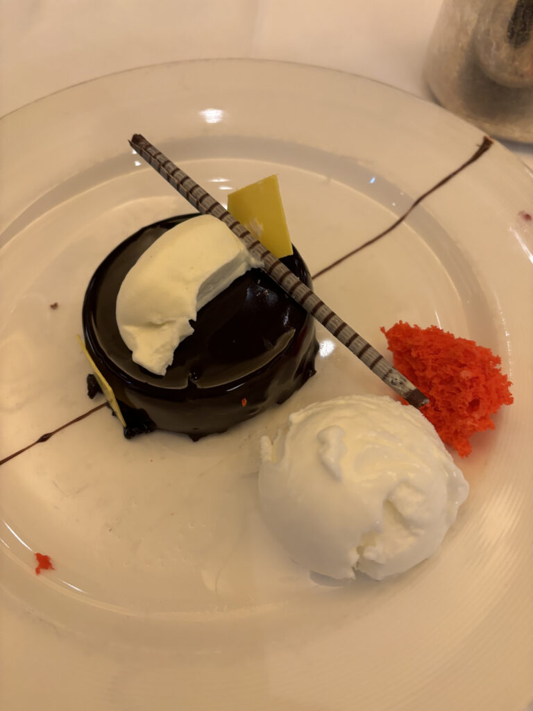 a plate of dessert with a spoon