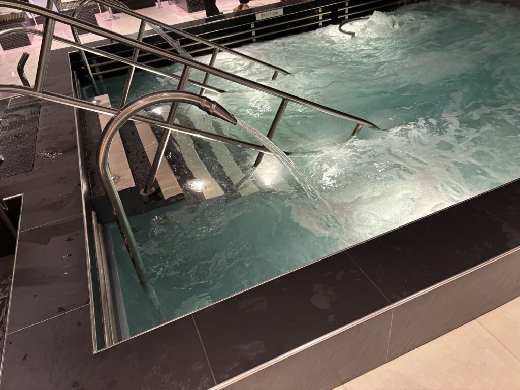 a pool with water running out of it