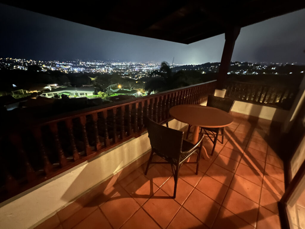 a table and chairs on a deck