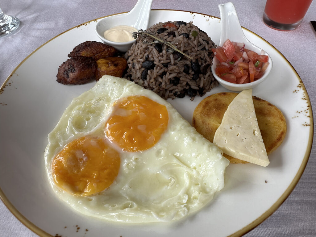 a plate of food with eggs and rice