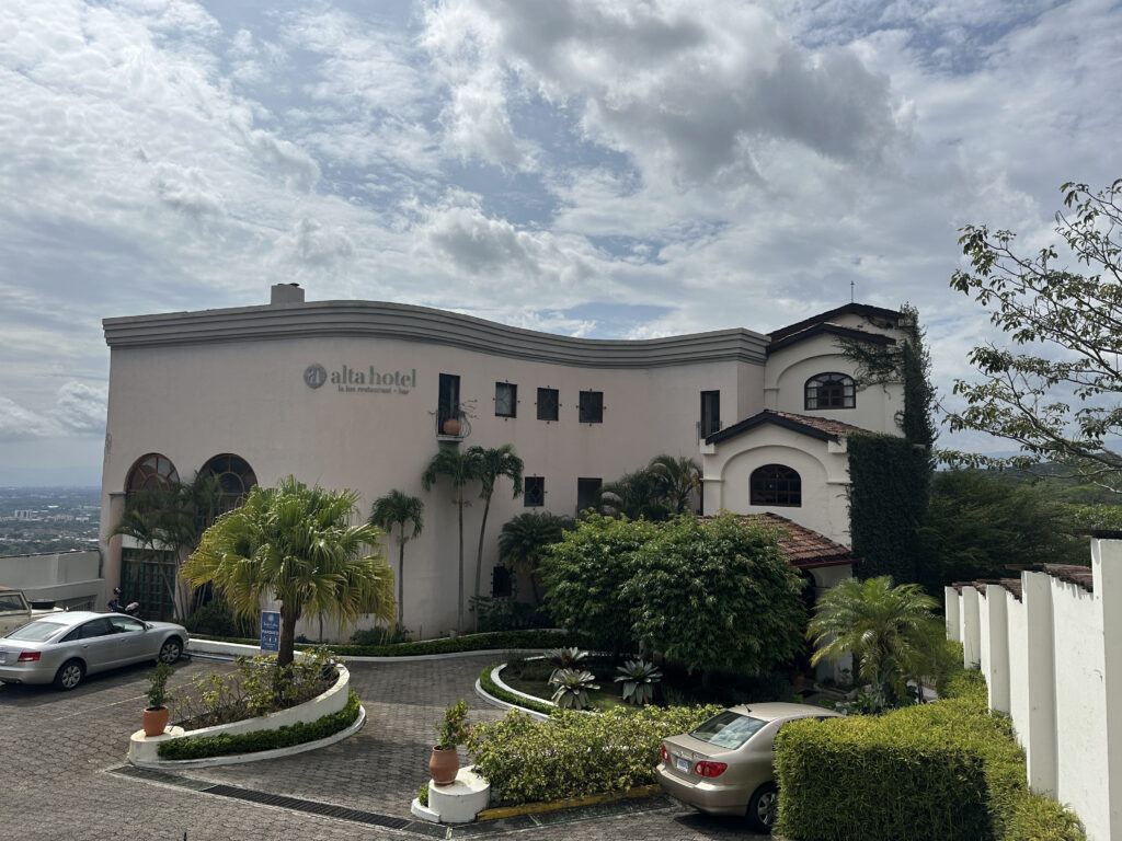 a building with trees and bushes