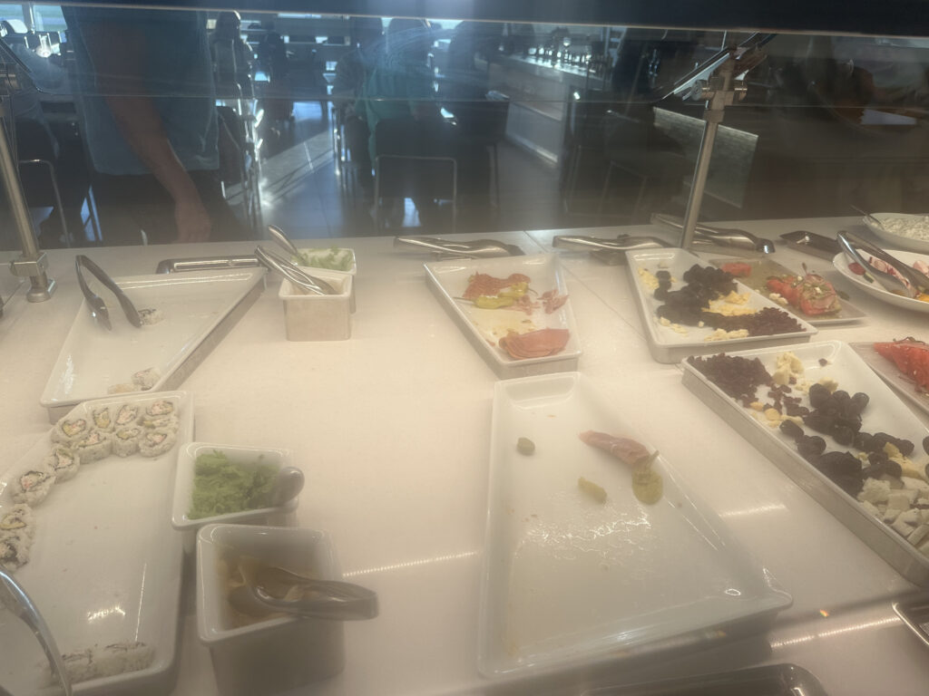 a buffet table with different food items on it