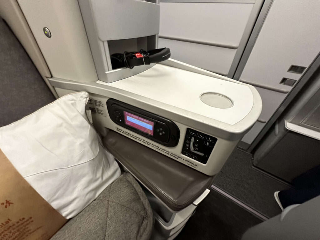 a white object with a black screen on it