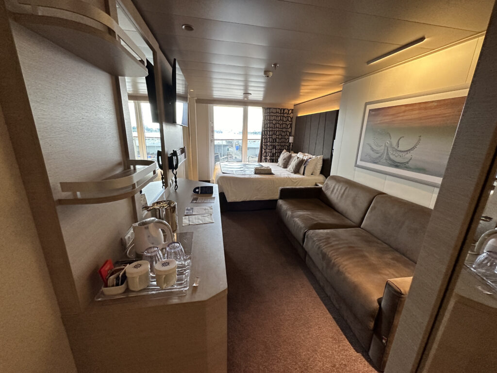 a room with a bed and a couch