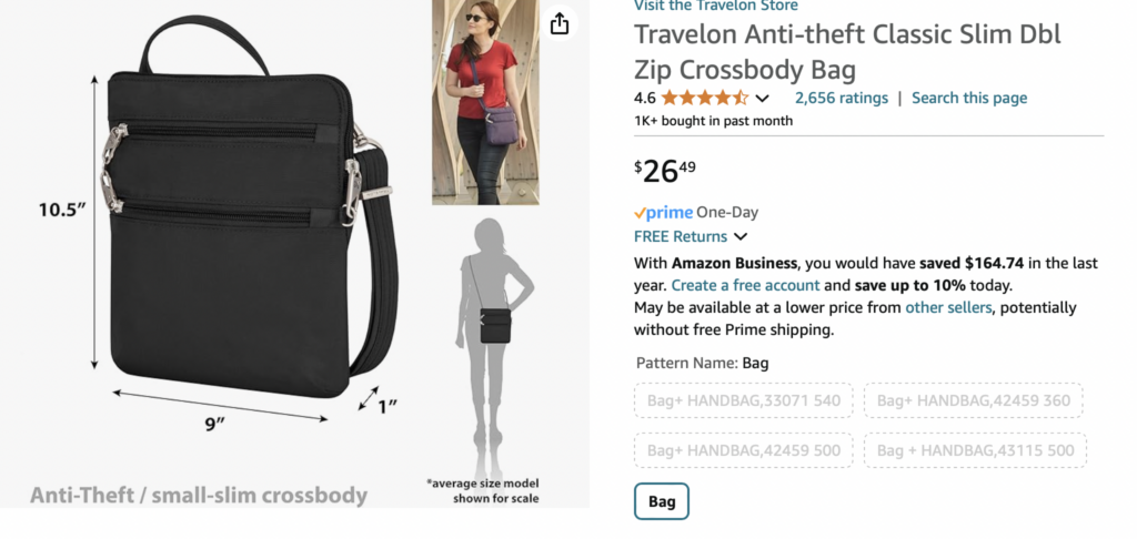 a black bag with a woman standing in front of it