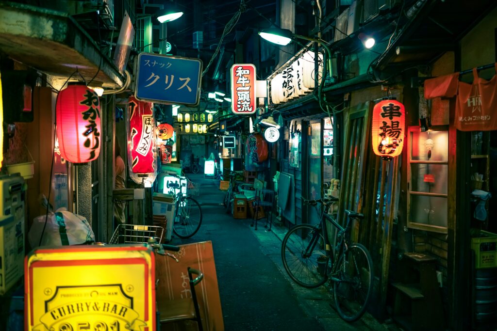 a alley with signs and signs