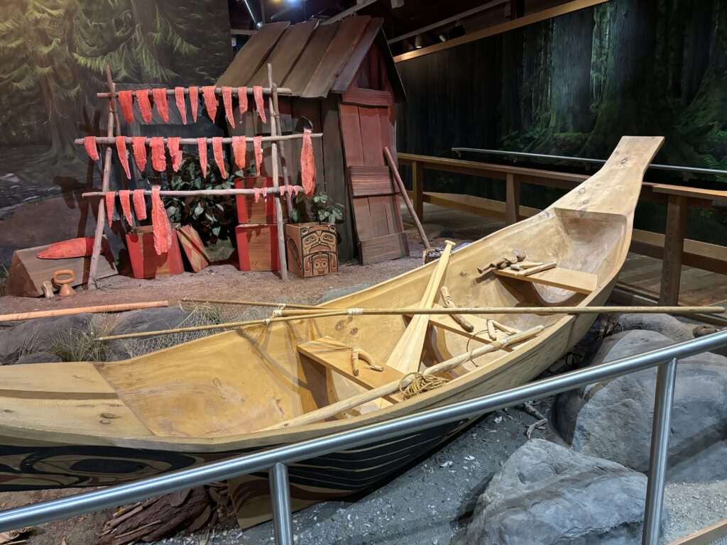 a wooden boat in a room