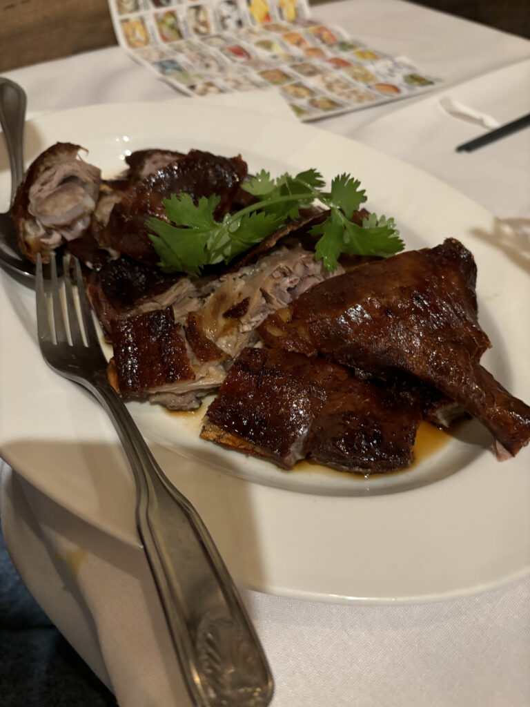 a plate of meat and a fork