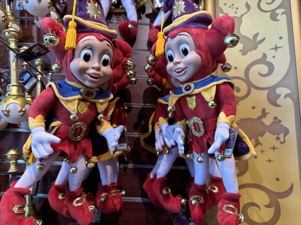 a group of dolls on a wall