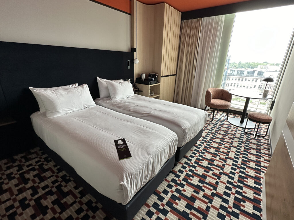 two beds in a hotel room