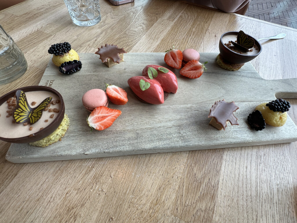 a plate of desserts on a table