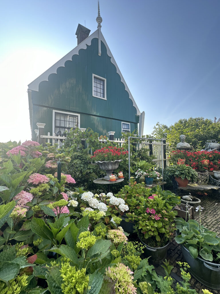 a house with a garden of flowers
