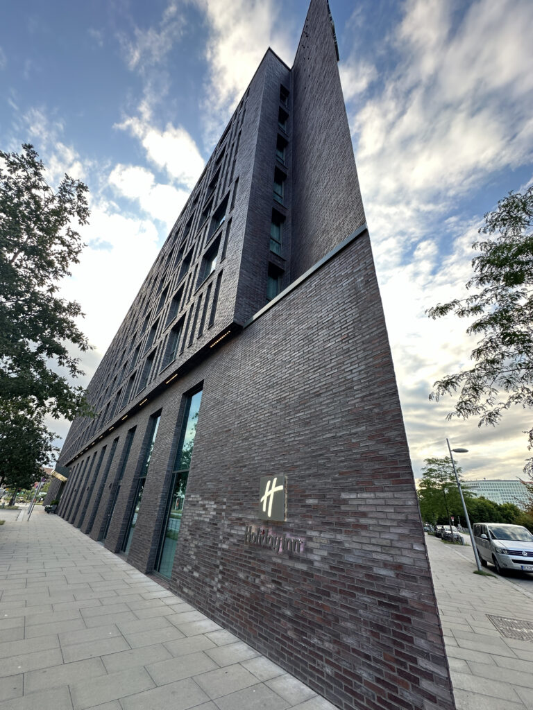 a building with a tall brick wall