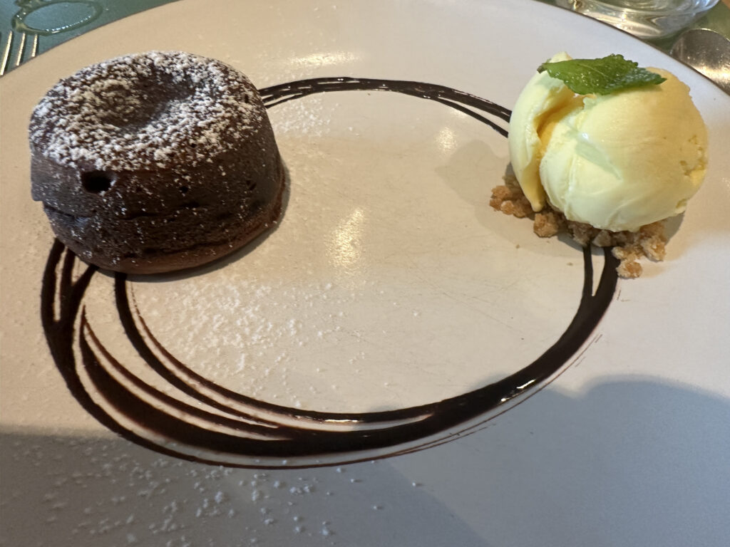 a chocolate cake and ice cream on a plate