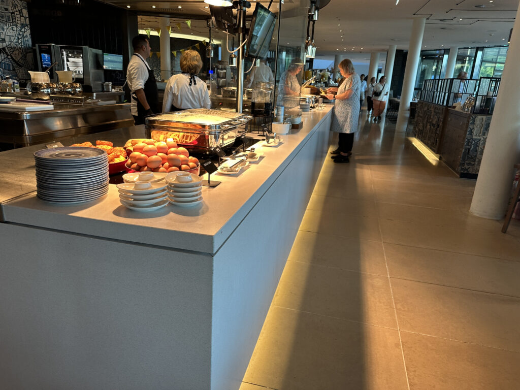 people standing at a buffet
