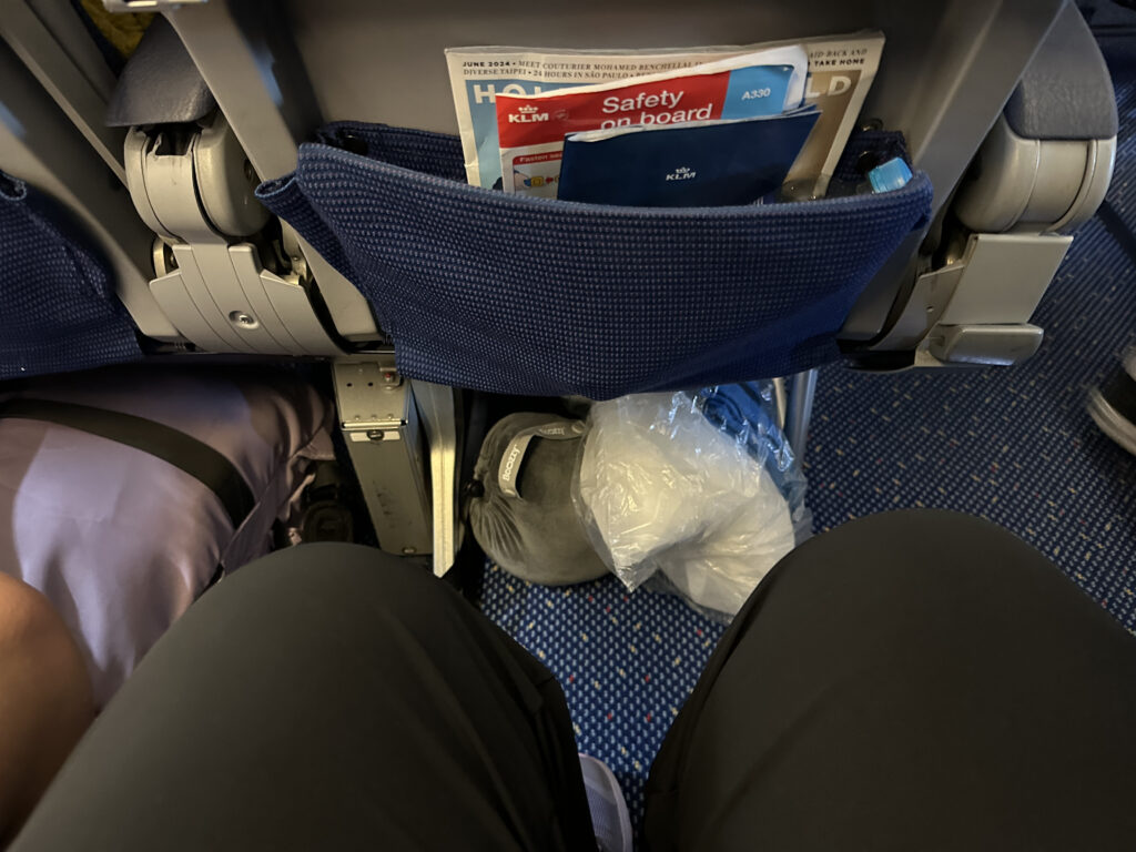 a seat with a pocket in the back of the seat