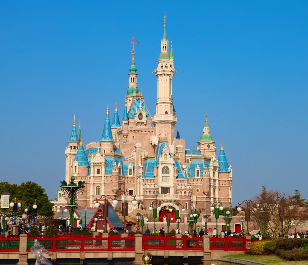 a castle with blue and white towers