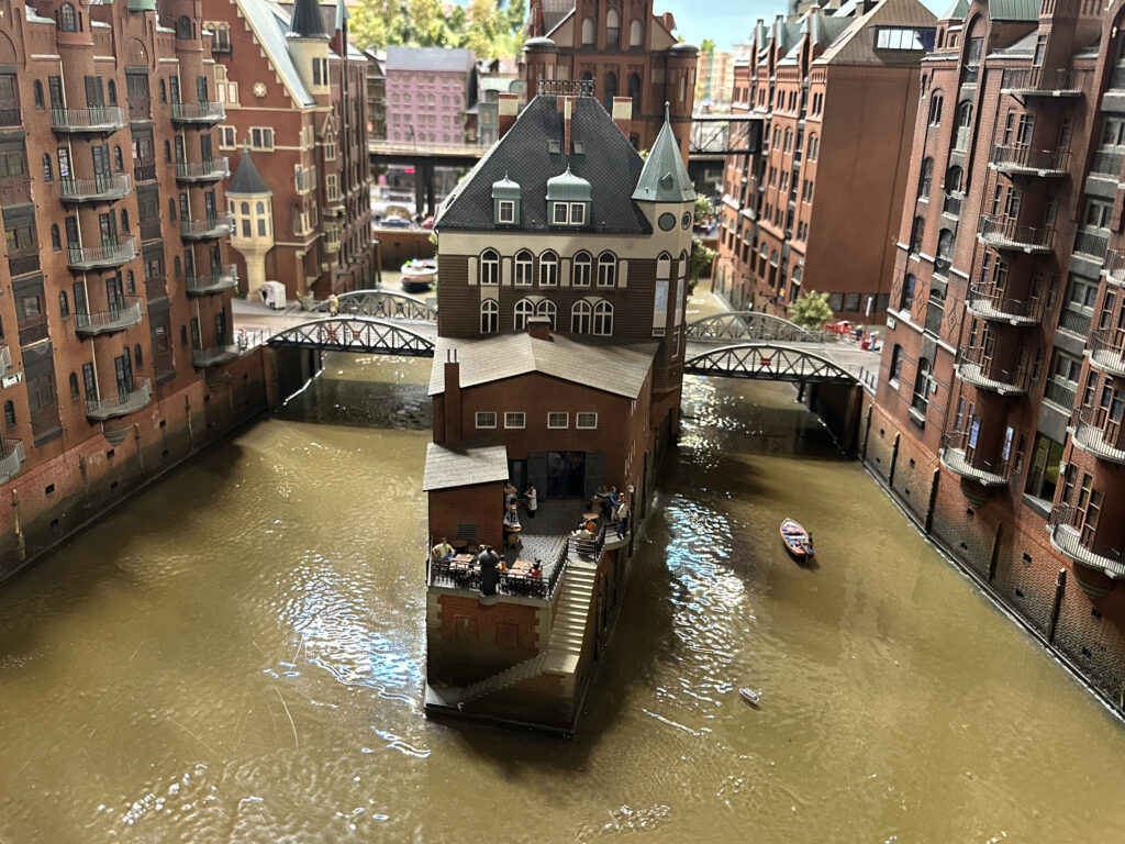 a model of a building in a river
