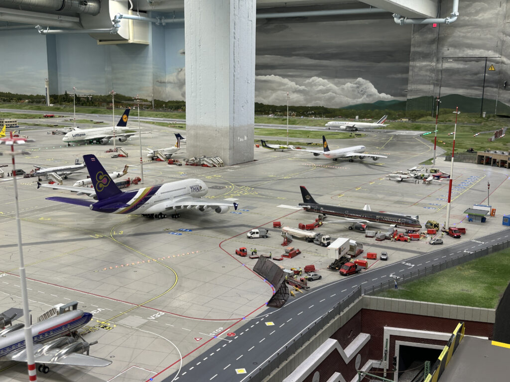 a model of airplanes on a runway