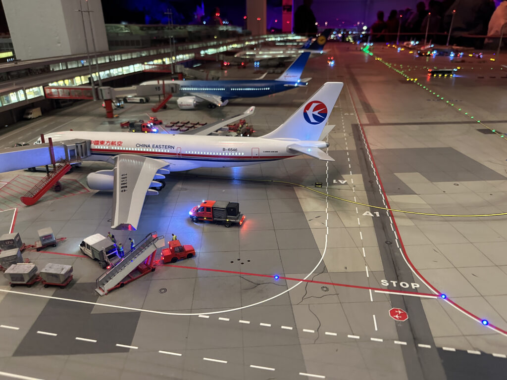 a model airplane on a runway