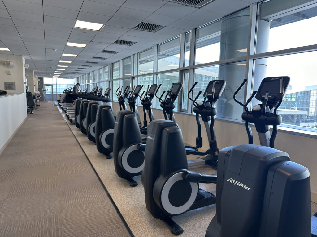 a group of exercise machines in a room