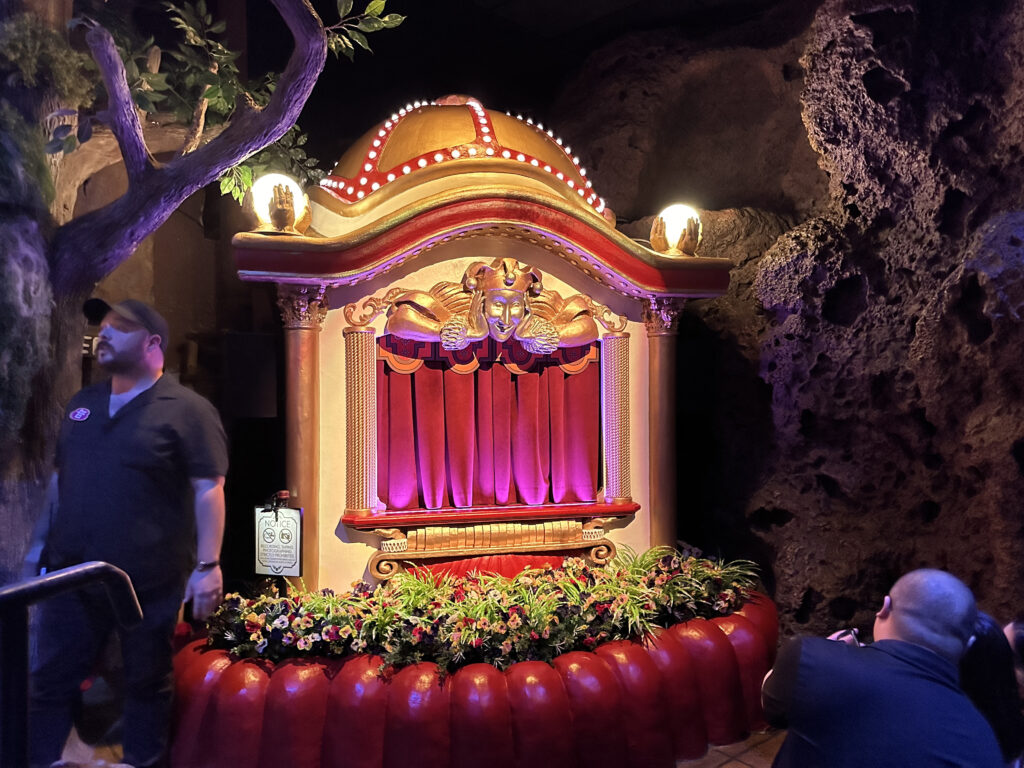 a stage with a stage and a man standing next to it