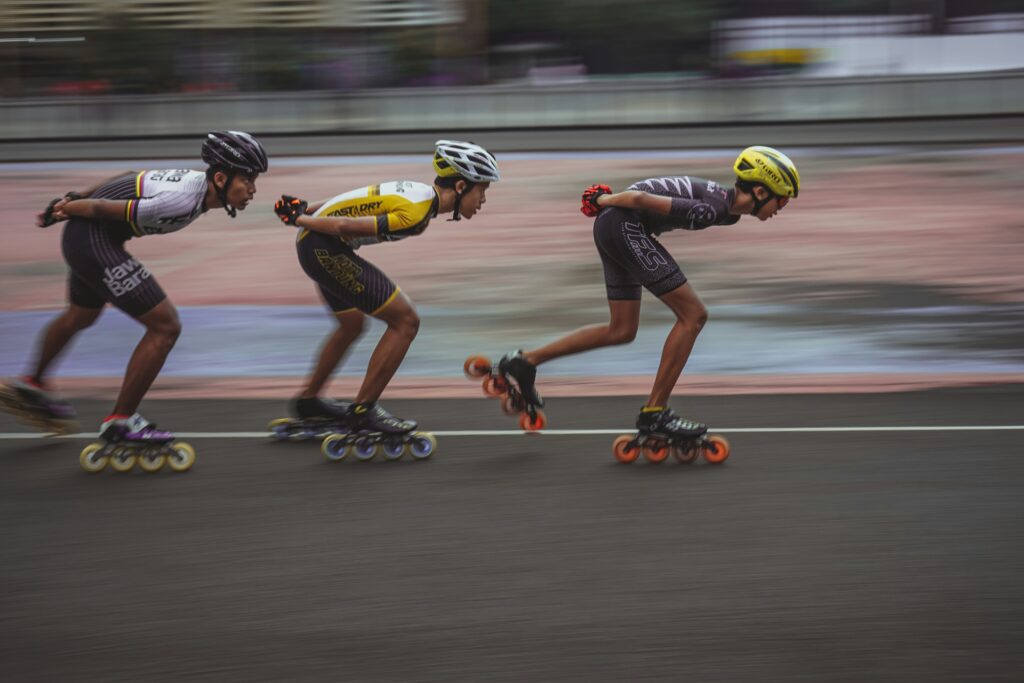a group of people on rollerblades