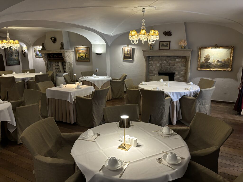 a room with tables and chairs