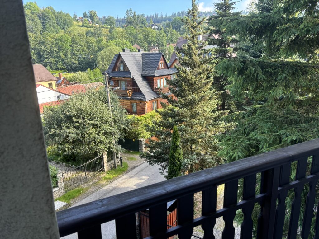 a view of a house from a balcony