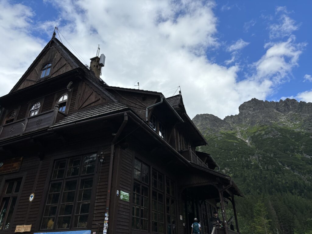 a building with a mountain in the background