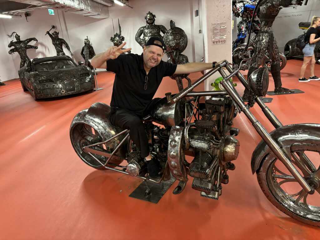 a man sitting on a motorcycle