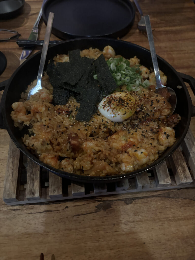 a pan of food with spoons