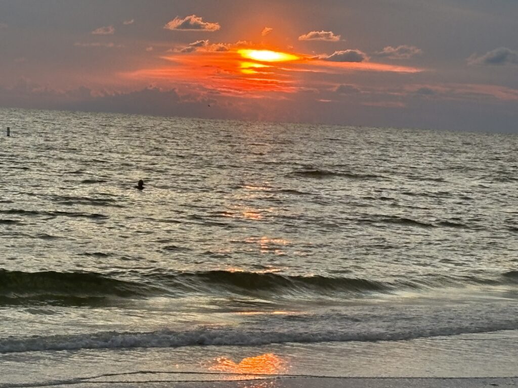 a sunset over the ocean