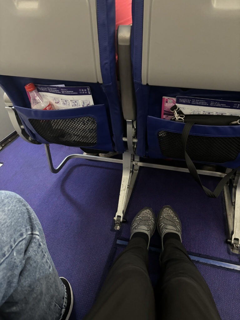 a pair of seats with a pocket in the back