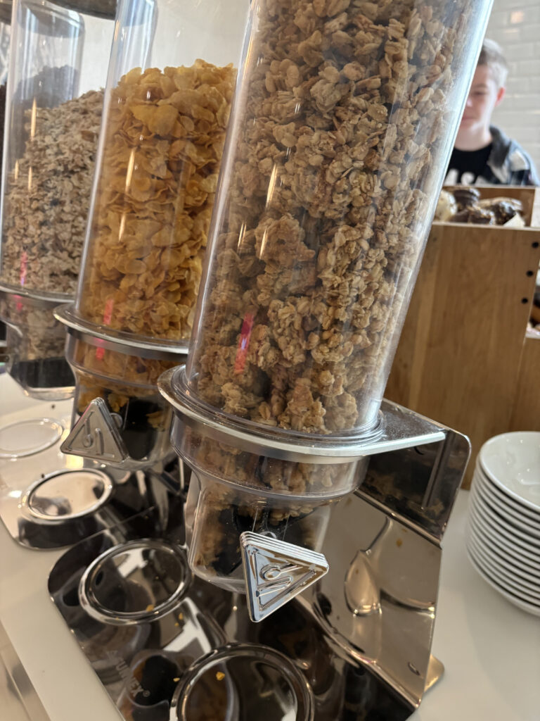 a group of cereals in a dispenser