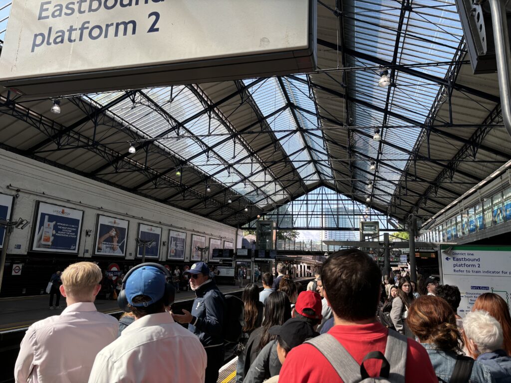 a group of people in a train station