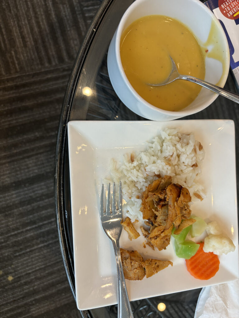 a plate of food and a bowl of soup