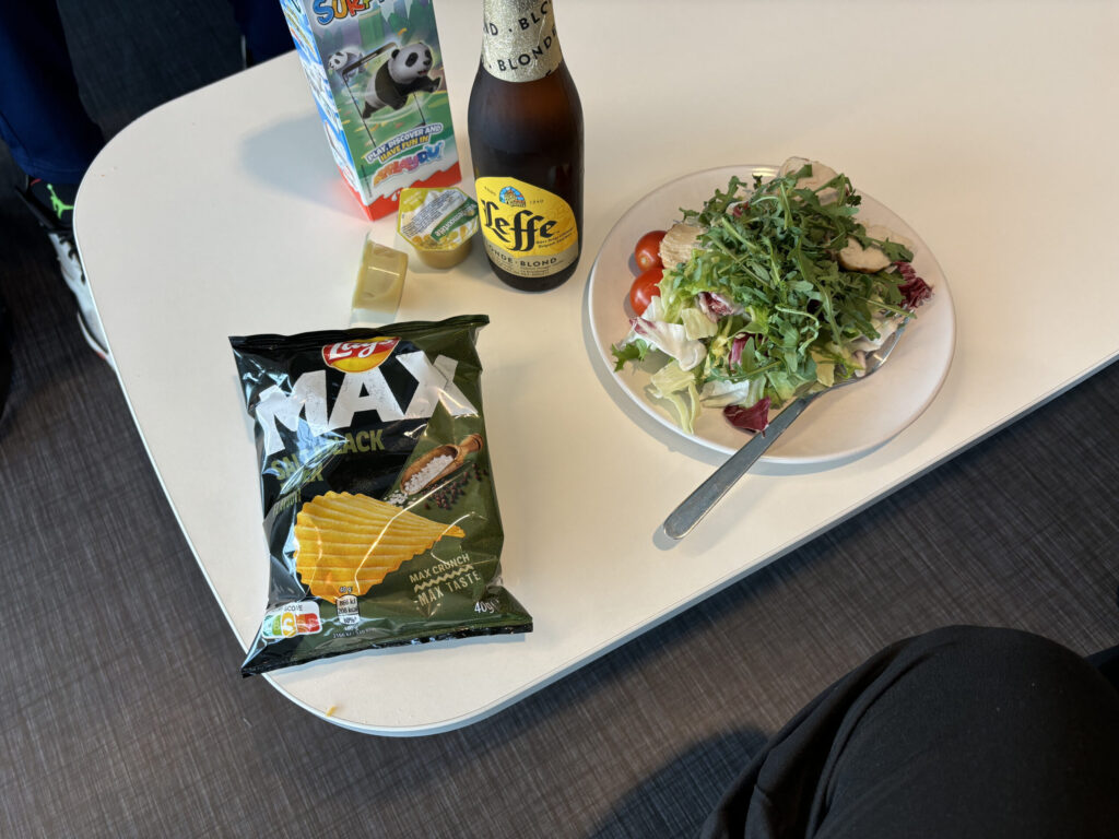 a salad and chips on a table