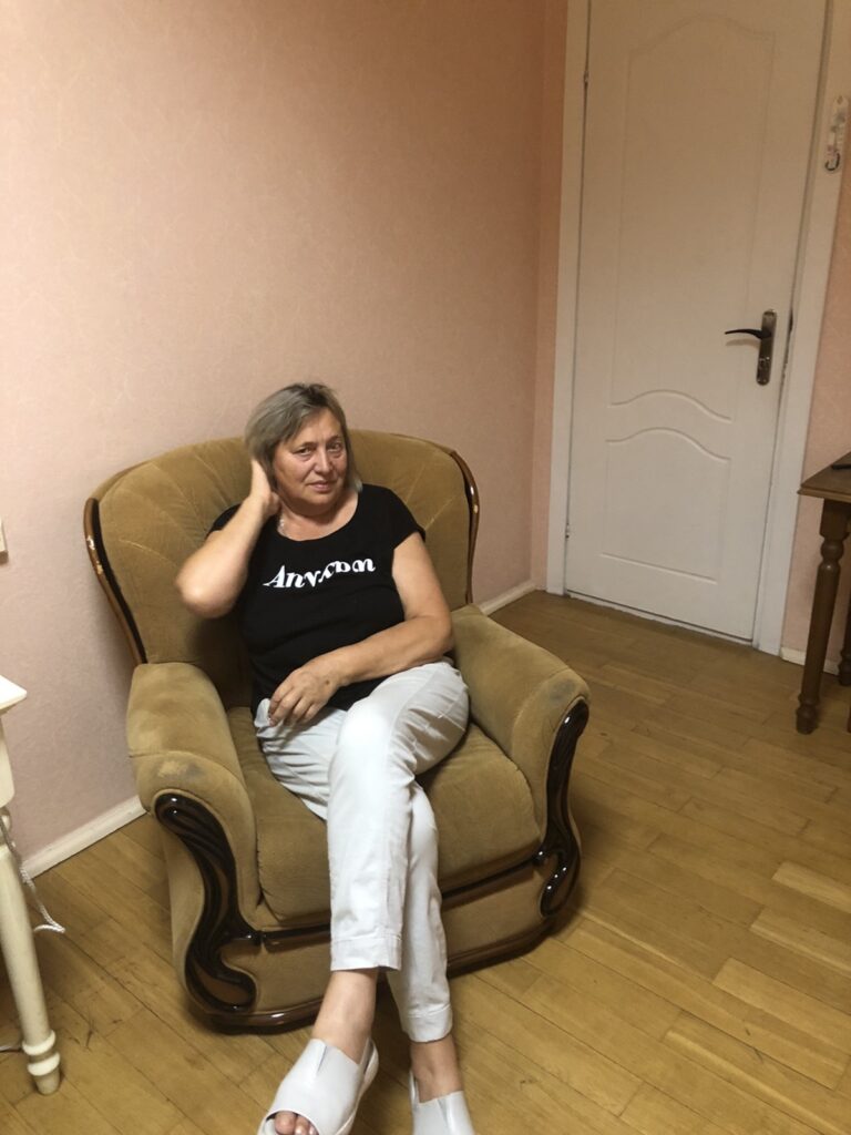 a woman sitting in a chair