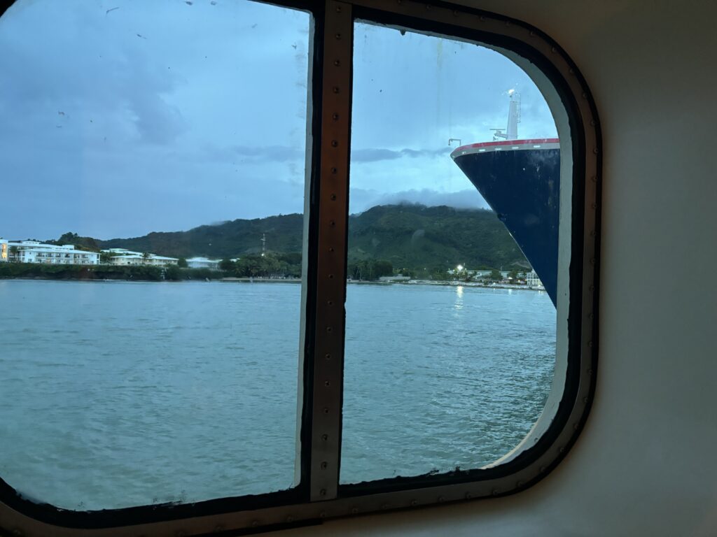 a view of a ship from a window of a boat