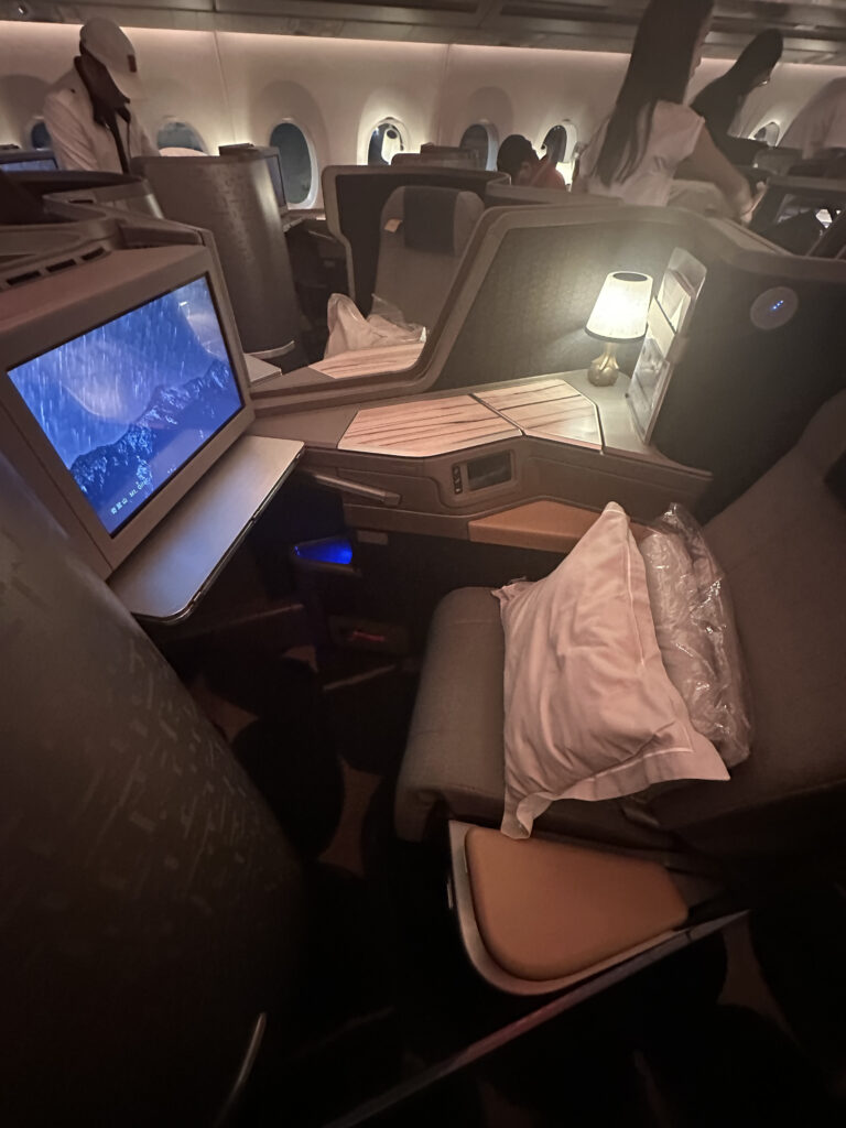 a tv and chair in an airplane