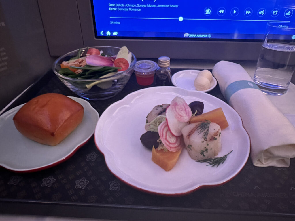 food on a tray with a television