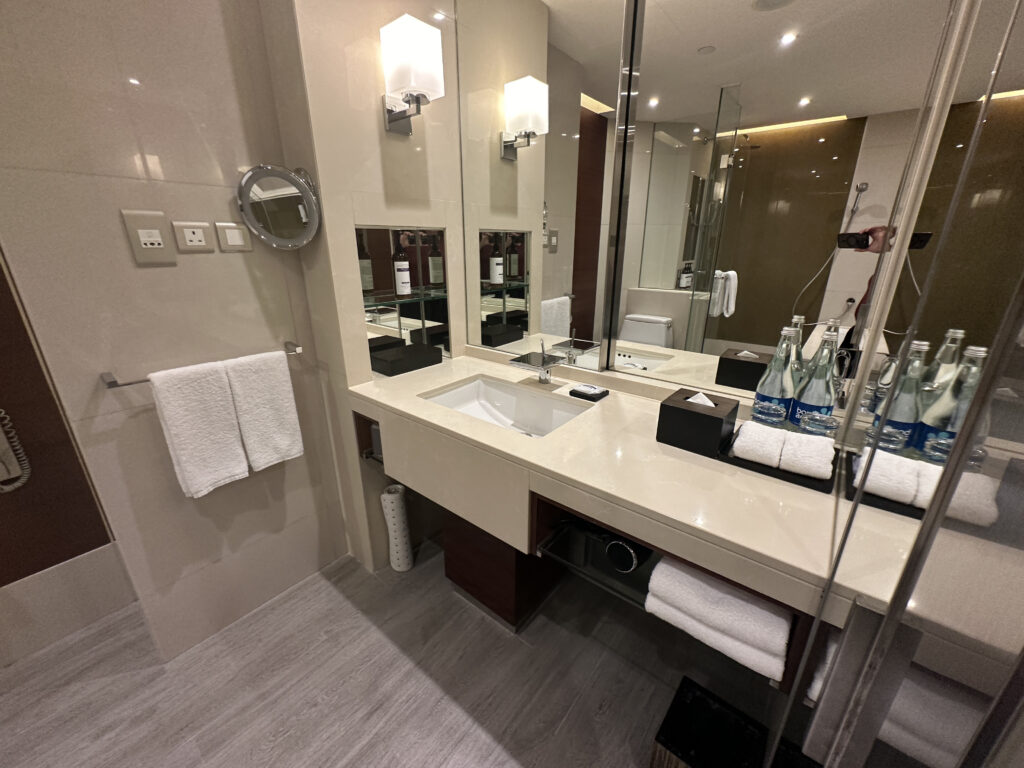 a bathroom with a mirror and sink