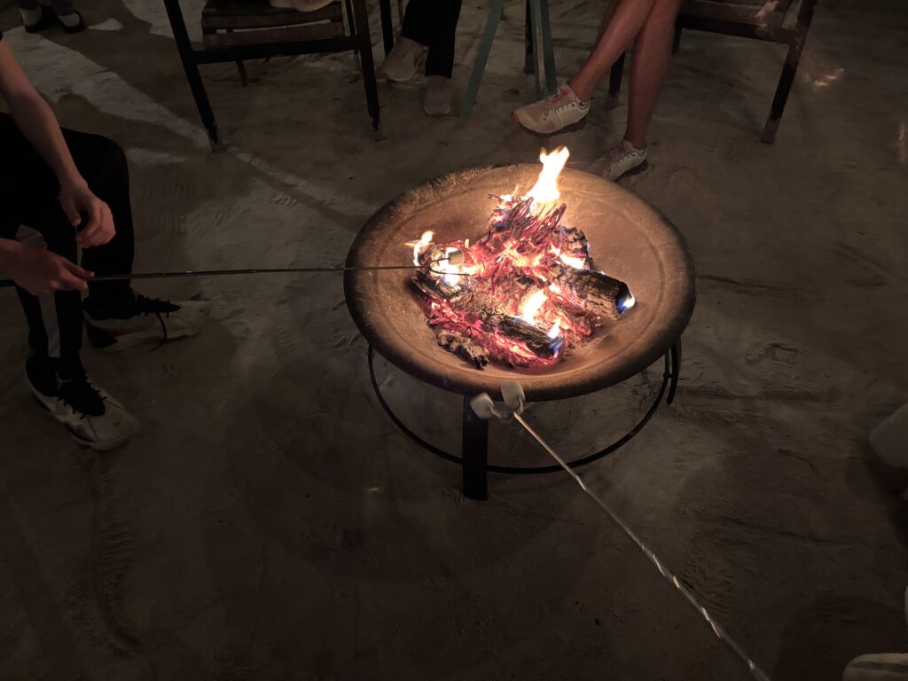 a fire pit with a stick sticking out of it