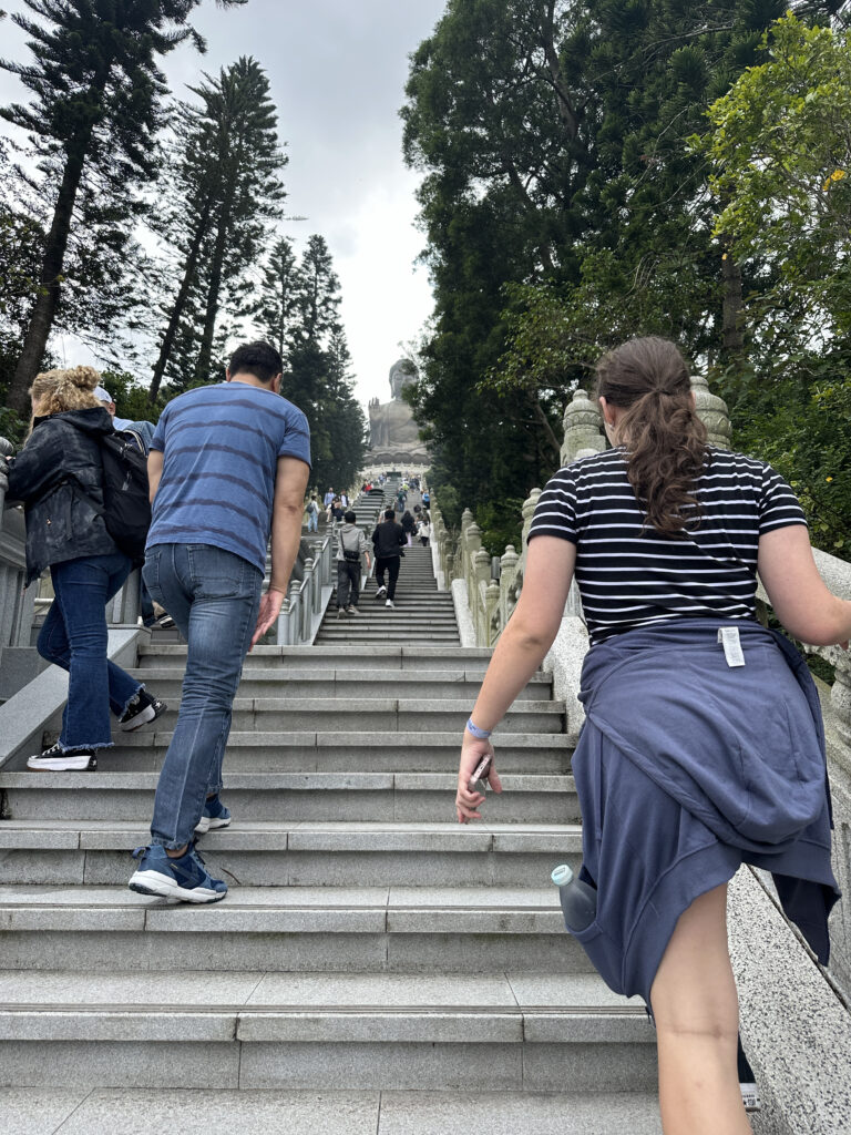 a group of people walking up stairs