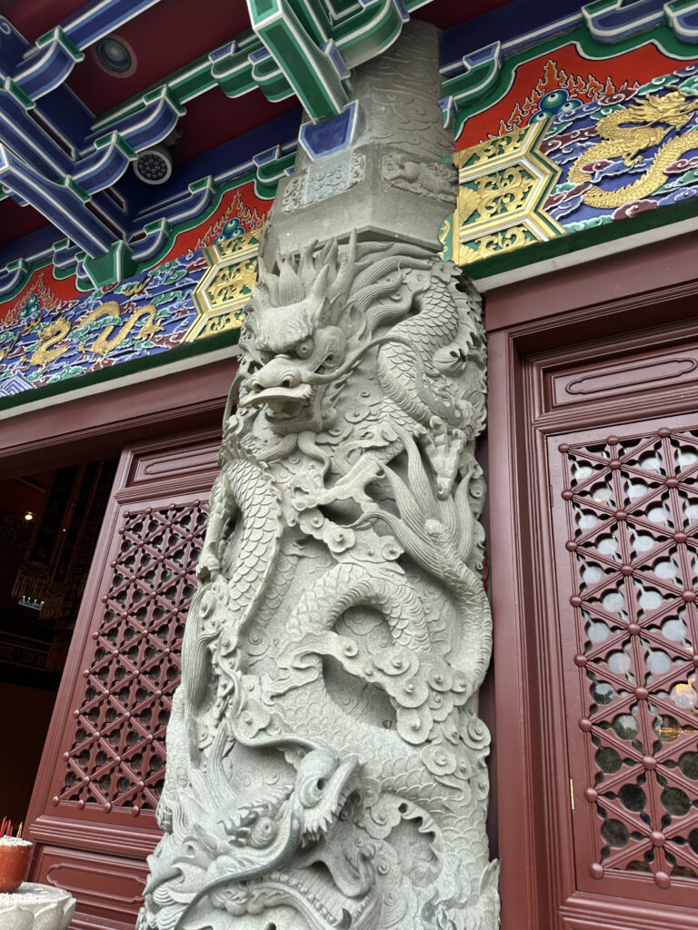 a stone sculpture of a dragon