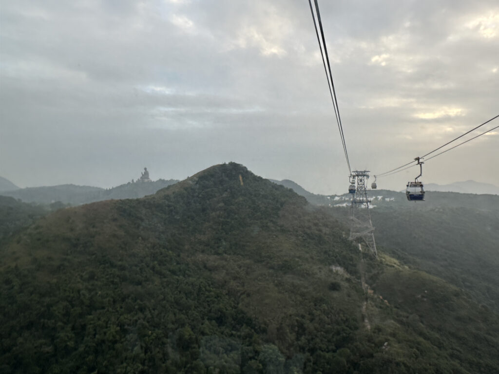 a cable car going up a hill